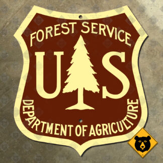 U.S. Forest Service shield logo sign