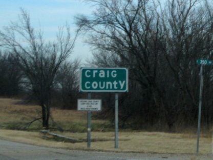 Craig County Oklahoma county line sign in the field